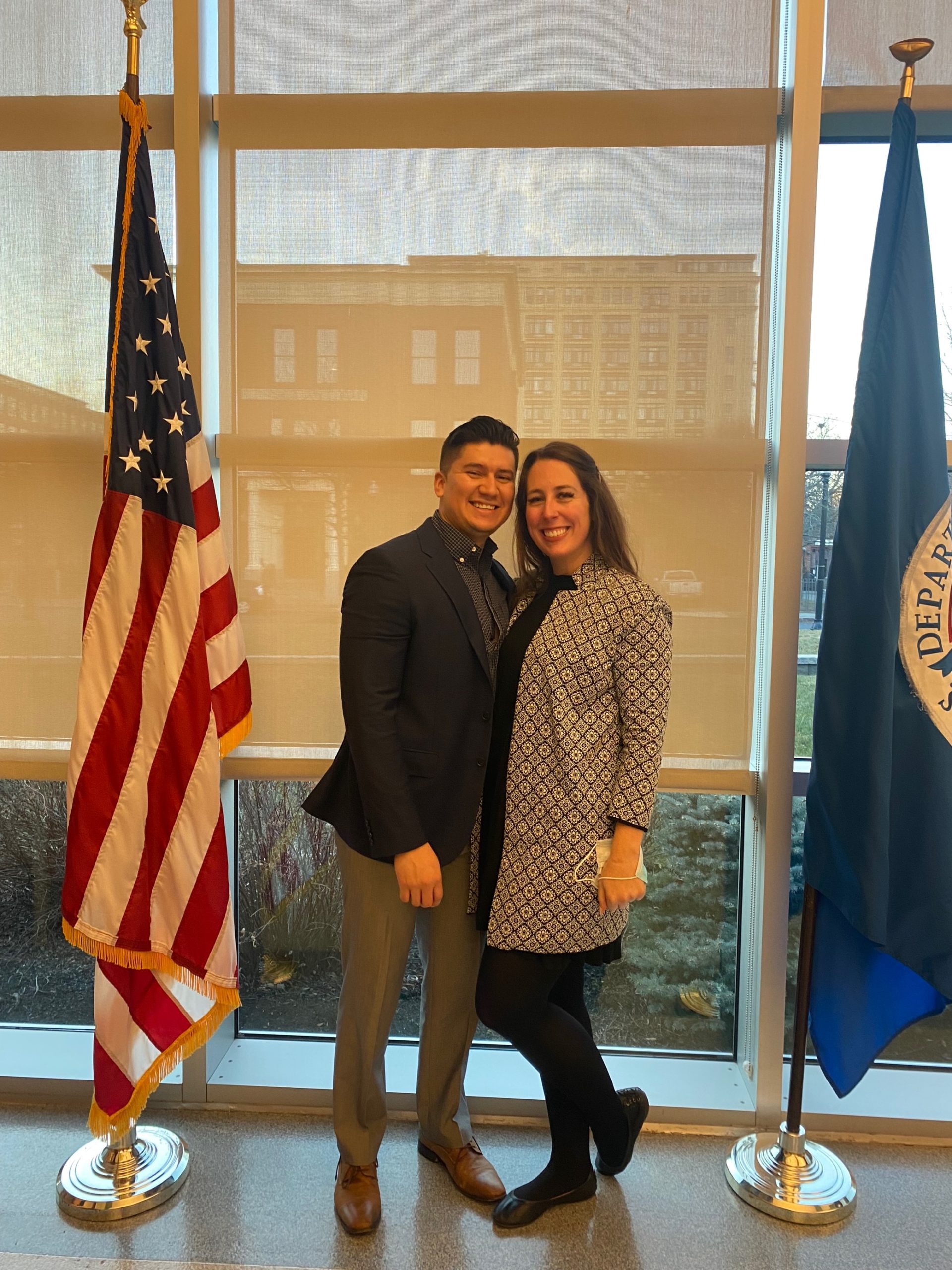 Me and my wife Samantha at USCIS on the day my green card was approved.