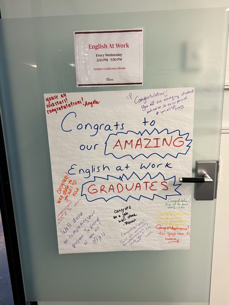 Messages of congratulations from the Pret-A-Manger team to the EAW graduates posted on the classroom door.